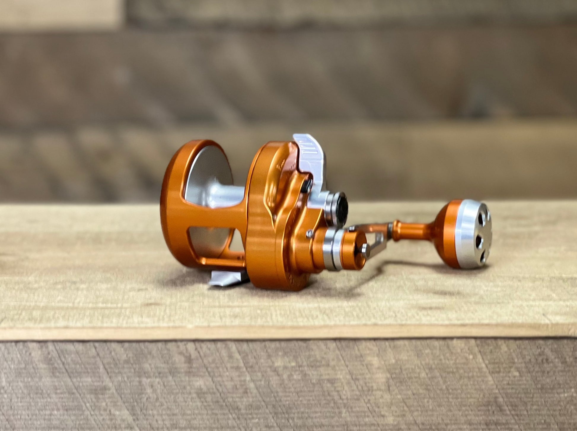 Orange/Silver Boss Xtreme 600N Lefty 2-Speed – Accurate Fishing